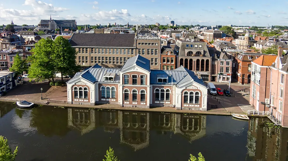aerial view of Leiden campus building on water's edge